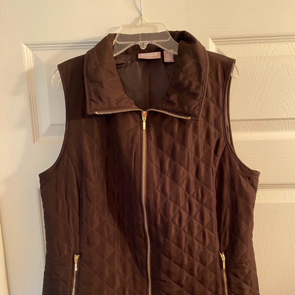 Chico’s Light Weight Quilted Vest.  Size: 1.  Color: Brown.  Length:  25”.